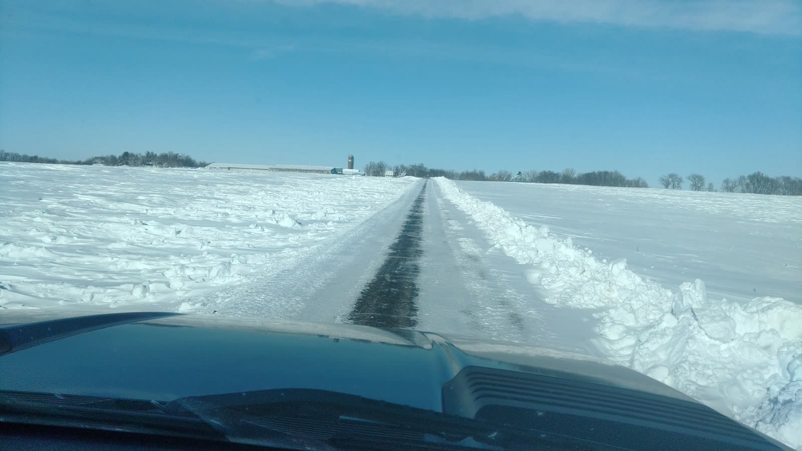 The snowy lane to the farm